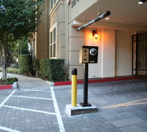 SOFTtop-plastic-bollard-cap-black-bollard-protecting-callbox-residential-gated-community